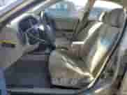 2002 Hyundai Elantra GLS z VIN KMHDN45D22U434479, wystawiony jako Copart lot #77869634 z przebiegiem 231 962 mil mil oraz Szkoda całkowita • Salvage title. Historia ofert i sprzedaży dostępna na DreamBid. Obrazek 7.