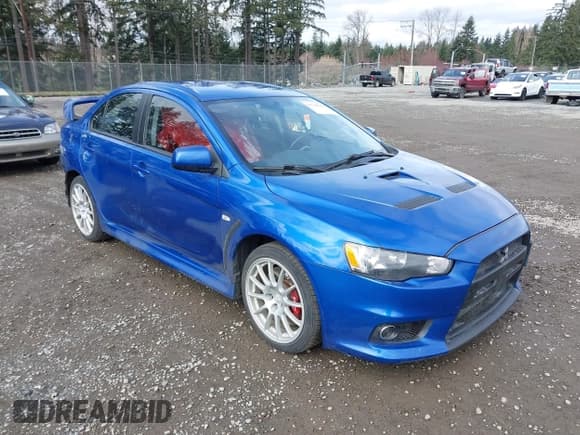 ✅ 2015 Mitsubishi Lancer Evolution GSR • VIN: JA32W8FV4FU012578 • Lot: 41730742. Wystawiony na IAAI z przebiegiem 64 762 mil. Bezpłatny archiwum sprzedaży aukcyjnych z USA i szczegółowy raport historii pojazdu na DreamBid. Zdjęcie 1.