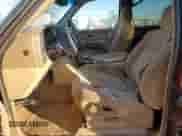 2000 Chevrolet Suburban LS с VIN 3GNEC16T2YG160819, выставлен на аукционе Copart как лот 77664344 с пробегом 200 816 миль миль и Списание • Salvage title. История ставок и продаж доступна на DreamBid. Изображение 7.