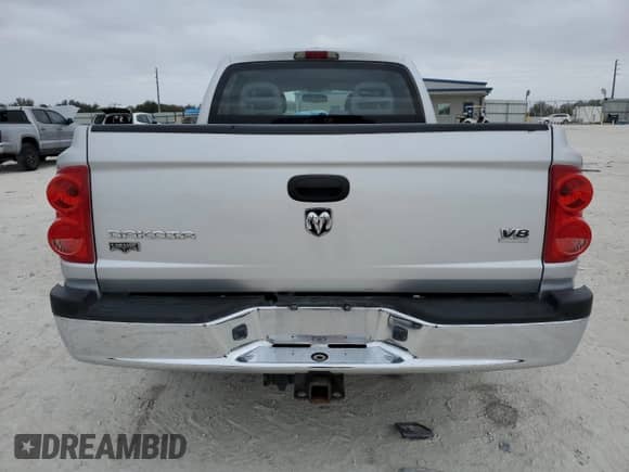 2006 Dodge Dakota Laramie with VIN 1D7HE58N06S641184, listed as a Copart auction lot 43596945 with 173,809 mi miles and Salvage title. Bid and sale history available at DreamBid. Image 6.