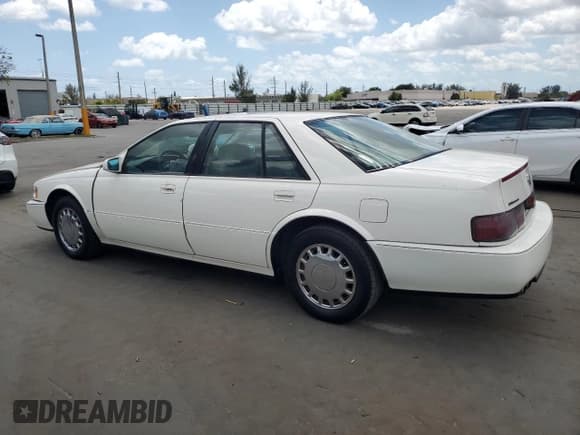 ✅ 1993 Cadillac Seville STS • VIN: 1G6KY5296PU814007 • Lot: 53470175. Listed on Copart with 127,366 mi. Free auction sales archive from the USA and detailed vehicle history report at DreamBid. Image 2.