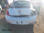 ✅ 2013 Volkswagen Beetle 2.0T • VIN: 3VW7T7AT8DM828112 • Lot: 43615215. Wystawiony na IAAI z przebiegiem Nie podano. Bezpłatny archiwum sprzedaży aukcyjnych z USA i szczegółowy raport historii pojazdu na DreamBid. Zdjęcie 6.