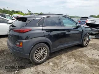 ✅ 2018 Hyundai Kona SEL • VIN: KM8K62AA9JU097151 • Лот: 64304364. Опубликован ранее на Copart с пробегом 85 498 миль. Бесплатный доступ к архиву аукционных продаж из США и подробный отчёт об истории автомобиля на DreamBid. Изображение 3.