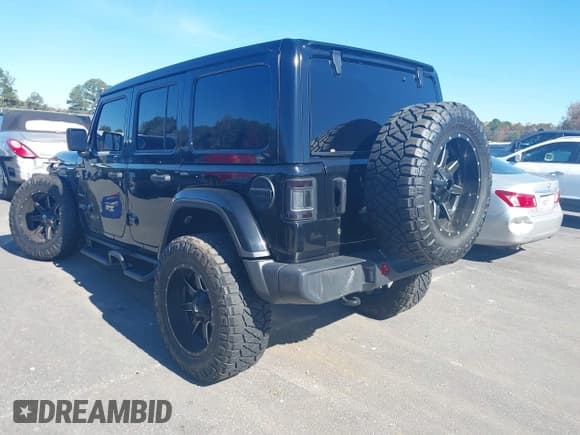 ✅ 2019 Jeep Wrangler Unlimited Sahara • VIN: 1C4HJXEG1KW572693 • Lot: 43697259. Listed on IAAI with 42,087 mi. Free auction sales archive from the USA and detailed vehicle history report at DreamBid. Image 3.