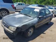 ✅ 1997 Geo Prizm LSi • VIN: 1Y1SK5267VZ447232 • Lot: 42289597. Listed on IAAI with 100,974 mi. Free auction sales archive from the USA and detailed vehicle history report at DreamBid. Image 2.