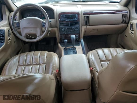 ✅ 2000 Jeep Grand Cherokee Limited • VIN: 1J4GW58N5YC174371 • Lot: 60941615. Listed on Copart with 179,399 mi. Free auction sales archive from the USA and detailed vehicle history report at DreamBid. Image 8.