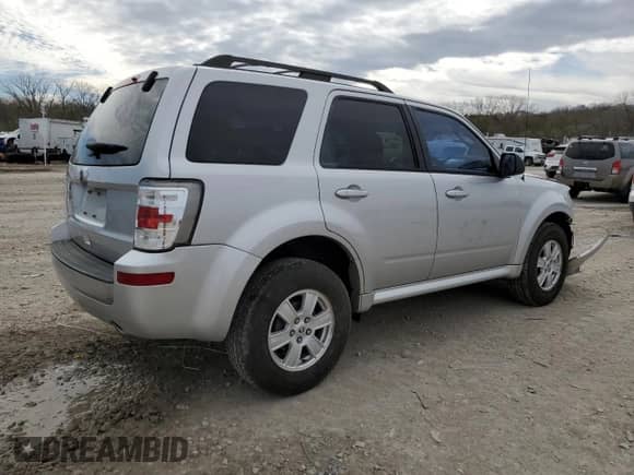 2011 Mercury Mariner z VIN 4M2CN8B73BKJ06886, wystawiony jako Copart lot #50308485 z przebiegiem 118 584 mil mil oraz Szkoda całkowita • Salvage title. Historia ofert i sprzedaży dostępna na DreamBid. Obrazek 3.