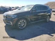 ✅ 2023 BMW X5 xDrive45e • VIN: 5UXTA6C03P9N92460 • Лот: 87025515. Опубликован ранее на Copart с пробегом 65 068 миль. Бесплатный доступ к архиву аукционных продаж из США и подробный отчёт об истории автомобиля на DreamBid. Изображение 1.