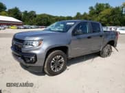 ✅ 2021 Chevrolet Colorado 4WD Z71 • VIN: 1GCGTDEN8M1241774 • Лот: 71227364. Опубликован ранее на Copart с пробегом 49 518 миль. Бесплатный доступ к архиву аукционных продаж из США и подробный отчёт об истории автомобиля на DreamBid. Изображение 1.