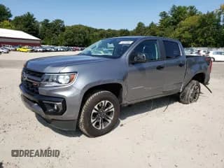 ✅ 2021 Chevrolet Colorado 4WD Z71 • VIN: 1GCGTDEN8M1241774 • Лот: 71227364. Опубликован ранее на Copart с пробегом 49 518 миль. Бесплатный доступ к архиву аукционных продаж из США и подробный отчёт об истории автомобиля на DreamBid. Изображение 1.