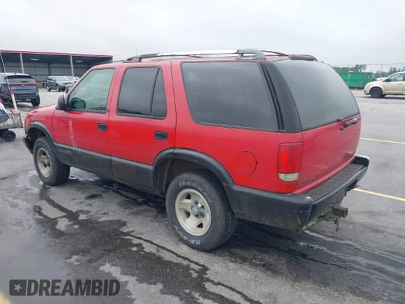 1995 Chevrolet Blazer z VIN 1GNCS13W7S2172327, wystawiony jako IAAI lot #42441948 z przebiegiem 174 250 mil mil oraz . Historia ofert i sprzedaży dostępna na DreamBid. Obrazek 3.