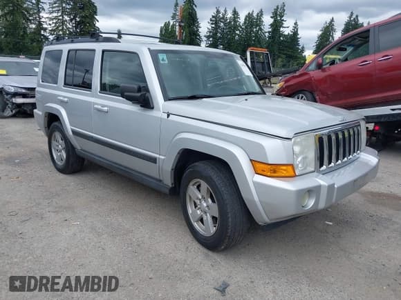 ✅ 2007 Jeep Commander Sport • VIN: 1J8HG48P47C556787 • Lot: 42695897. Listed on IAAI with 146,272 mi. Free auction sales archive from the USA and detailed vehicle history report at DreamBid. Image 1.
