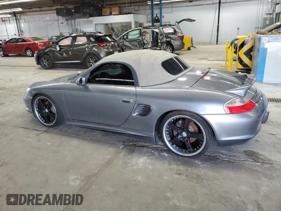 ✅ 2003 Porsche Boxster • VIN: WP0CA29863U624834 • Лот: 59116125. Опубликован ранее на Copart с пробегом Не указан. Бесплатный доступ к архиву аукционных продаж из США и подробный отчёт об истории автомобиля на DreamBid. Изображение 2.