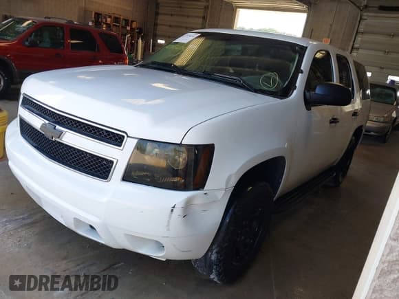✅ 2014 Chevrolet Tahoe Commercial • VIN: 1GNLC2E07ER188521 • Lot: 42715650. Wystawiony na IAAI z przebiegiem 194 028 mil. Bezpłatny archiwum sprzedaży aukcyjnych z USA i szczegółowy raport historii pojazdu na DreamBid. Zdjęcie 2.