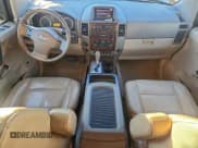 ✅ 2011 Nissan Titan SL • VIN: 1N6AA0EC1BN305465 • Lot: 97016175. Listed on Copart with 237,523 mi. Free auction sales archive from the USA and detailed vehicle history report at DreamBid. Image 8.