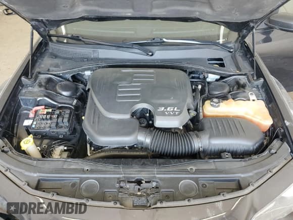 ✅ 2015 Chrysler 300 S • VIN: 2C3CCABG3FH736007 • Lot: 81044175. Listed on Copart with 173,171 mi. Free auction sales archive from the USA and detailed vehicle history report at DreamBid. Image 11.