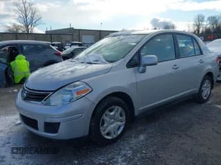 ✅ 2010 Nissan Versa S • VIN: 3N1BC1AP2AL406077 • Lot: 43790916. Listed on IAAI with 128,096 mi. Free auction sales archive from the USA and detailed vehicle history report at DreamBid. Image 2.