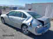 2013 Chevrolet Impala LS z VIN 2G1WF5E35D1265220, wystawiony jako IAAI lot #42559869 z przebiegiem 124 046 mil mil oraz . Historia ofert i sprzedaży dostępna na DreamBid. Obrazek 3.