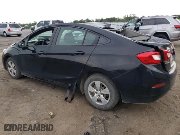 ✅ 2018 Chevrolet Cruze LS • VIN: 1G1BC5SM2J7210520 • Lot: 62313563. Listed on Copart with 118,481 mi. Free auction sales archive from the USA and detailed vehicle history report at DreamBid. Image 2.