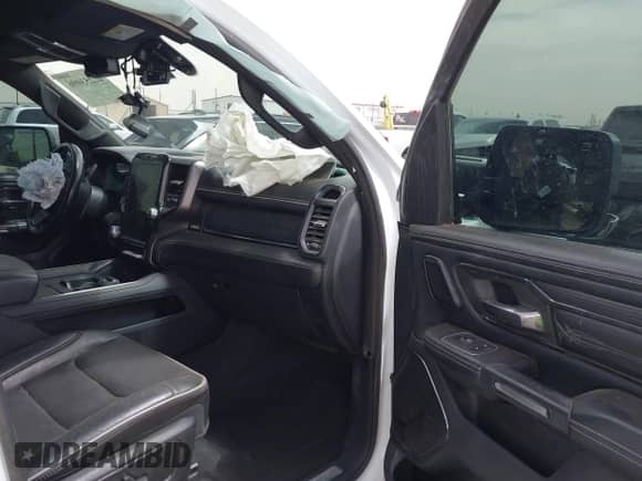 2023 Ram 1500 Limited with VIN 1C6SRFHT5PN576378, listed as a IAAI auction lot 42253096 with 41,802 mi miles and . Bid and sale history available at DreamBid. Image 5.