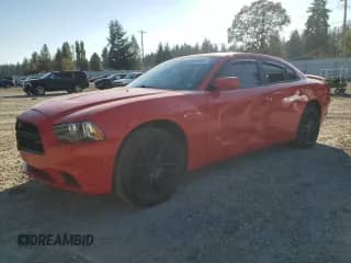 2014 Dodge Charger SXT with VIN 2C3CDXHG4EH117387, listed as a Copart auction lot 85516525 with 190,836 mi miles and Salvage title. Bid and sale history available at DreamBid. Image 1.