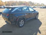 ✅ 2022 Hyundai Tucson SE • VIN: 5NMJACAE0NH053009 • Lot: 43550808. Listed on IAAI with 48,601 mi. Free auction sales archive from the USA and detailed vehicle history report at DreamBid. Image 4.