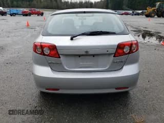 ✅ 2005 Suzuki Reno S • VIN: KL5JD66Z95K217050 • Lot: 86785194. Wystawiony na Copart z przebiegiem 77 614 mil. Bezpłatny archiwum sprzedaży aukcyjnych z USA i szczegółowy raport historii pojazdu na DreamBid. Zdjęcie 6.