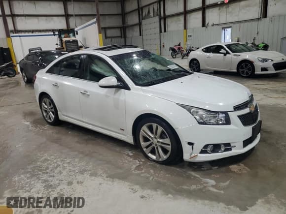✅ 2014 Chevrolet Cruze LTZ • VIN: 1G1PG5SB5E7203818 • Lot: 83825085. Listed on Copart with 94,394 mi. Free auction sales archive from the USA and detailed vehicle history report at DreamBid. Image 4.