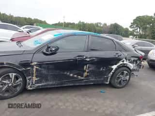 2021 Hyundai Elantra SEL with VIN KMHLM4AG1MU096705, listed as a IAAI auction lot 43237415 with 64,062 mi miles and . Bid and sale history available at DreamBid. Image 6.