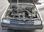 ✅ 1987 Toyota Corolla • VIN: JT2AE82E9H3531391 • Лот: 44657375. Опубликован ранее на Copart с пробегом 240 376 миль. Бесплатный доступ к архиву аукционных продаж из США и подробный отчёт об истории автомобиля на DreamBid. Изображение 11.