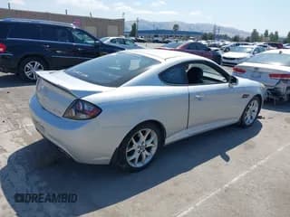 ✅ 2007 Hyundai Tiburon GT • VIN: KMHHN66F97U253187 • Лот: 40457431. Опубликован ранее на IAAI с пробегом 118 312 миль. Бесплатный доступ к архиву аукционных продаж из США и подробный отчёт об истории автомобиля на DreamBid. Изображение 4.