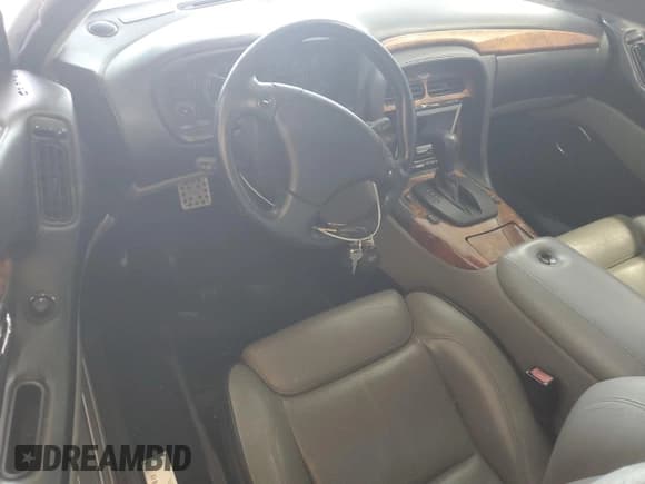 ✅ 2002 Aston Martin Vantage • VIN: SCFAB423X2K402372 • Lot: 81413585. Wystawiony na Copart z przebiegiem Nie podano. Bezpłatny archiwum sprzedaży aukcyjnych z USA i szczegółowy raport historii pojazdu na DreamBid. Zdjęcie 8.