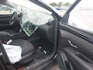 2023 Hyundai Tucson SE with VIN 5NMJACAE9PH183812, listed as a IAAI auction lot 43050593 with 18,512 mi miles and . Bid and sale history available at DreamBid. Image 5.