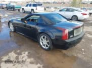 ✅ 2005 Cadillac XLR • VIN: 1G6YV34A155602458 • Lot: 43721615. Listed on IAAI with 106,799 mi. Free auction sales archive from the USA and detailed vehicle history report at DreamBid. Image 3.