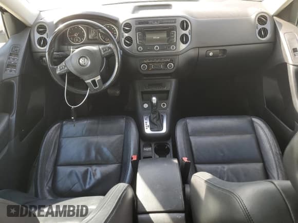 ✅ 2012 Volkswagen Tiguan S • VIN: WVGBV7AX6CW562562 • Lot: 87060975. Listed on Copart with 179,456 mi. Free auction sales archive from the USA and detailed vehicle history report at DreamBid. Image 8.