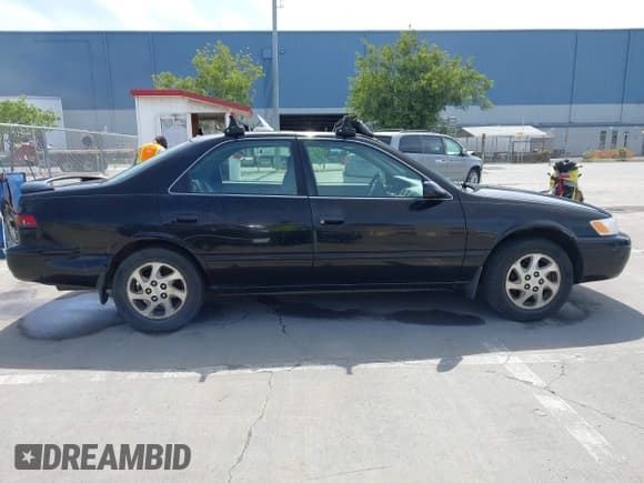 ✅ 1998 Toyota Camry LE • VIN: JT2BF28KXW0118504 • Lot: 42096672. Listed on IAAI with 257,358 mi. Free auction sales archive from the USA and detailed vehicle history report at DreamBid. Image 13.