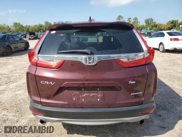 ✅ 2019 Honda CR-V Touring • VIN: 7FARW1H99KE014518 • Lot: 82637535. Wystawiony na Copart z przebiegiem 27 540 mil. Bezpłatny archiwum sprzedaży aukcyjnych z USA i szczegółowy raport historii pojazdu na DreamBid. Zdjęcie 6.