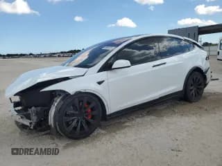 ✅ 2024 Tesla Model X • VIN: 7SAXCAE51RF449060 • Лот: 89554025. Опубликован ранее на Copart с пробегом 28 732 миль. Бесплатный доступ к архиву аукционных продаж из США и подробный отчёт об истории автомобиля на DreamBid. Изображение 1.
