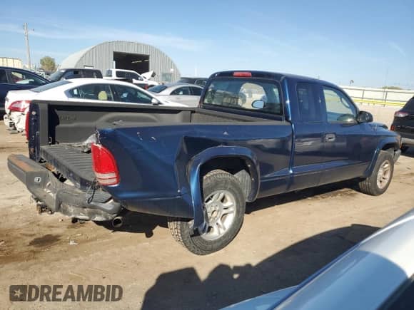 2004 Dodge Dakota с VIN 1D7GL12K24S670157, выставлен на аукционе Copart как лот 77800934 с пробегом 102 769 миль миль и Списание • Salvage title. История ставок и продаж доступна на DreamBid. Изображение 3.