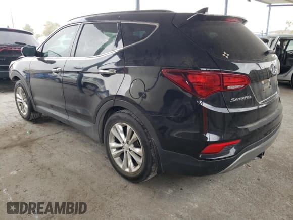 ✅ 2018 Hyundai Santa Fe 2.0T • VIN: 5NMZU4LA2JH075999 • Лот: 39291514. Опубликован ранее на Copart с пробегом 51 132 миль. Бесплатный доступ к архиву аукционных продаж из США и подробный отчёт об истории автомобиля на DreamBid. Изображение 2.