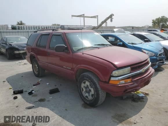 2002 Chevrolet Blazer LS z VIN 1GNDT13W42K185991, wystawiony jako Copart lot #70605164 z przebiegiem 208 342 mil mil oraz Szkoda całkowita • Salvage title. Historia ofert i sprzedaży dostępna na DreamBid. Obrazek 4.