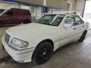 ✅ 1999 Mercedes-Benz C 230/260/280/320 • VIN: WDBHA29G7XA709264 • Lot: 59676075. Listed on Copart with 156,393 mi. Free auction sales archive from the USA and detailed vehicle history report at DreamBid. Image 1.