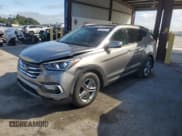 ✅ 2018 Hyundai Santa Fe 2.4L • VIN: 5XYZU3LB3JG556034 • Lot: 90231035. Listed on Copart with 26,542 mi. Free auction sales archive from the USA and detailed vehicle history report at DreamBid. Image 1.
