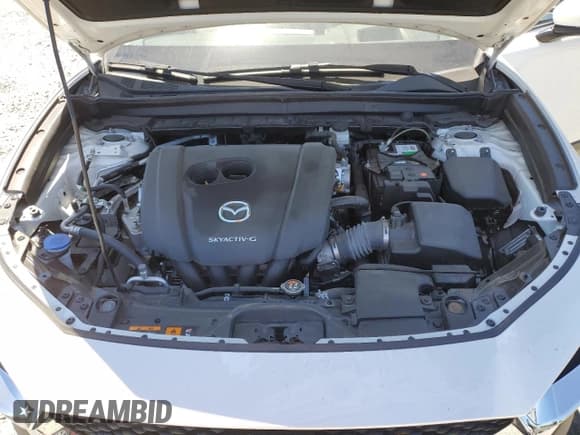 ✅ 2020 Mazda CX-30 Premium • VIN: 3MVDMBEM1LM132522 • Lot: 60744914. Wystawiony na Copart z przebiegiem 30 308 mil. Bezpłatny archiwum sprzedaży aukcyjnych z USA i szczegółowy raport historii pojazdu na DreamBid. Zdjęcie 11.