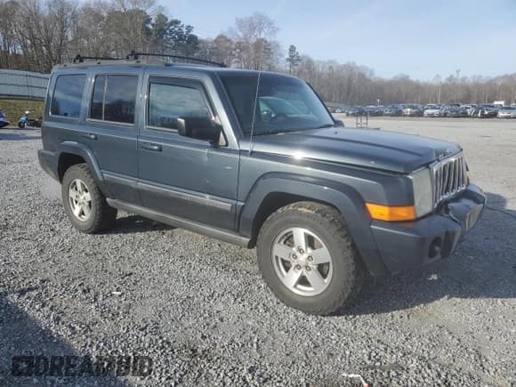 ✅ 2007 Jeep Commander Sport • VIN: 1J8HH48K07C587326 • Lot: 45929575. Listed on Copart with 220,018 mi. Free auction sales archive from the USA and detailed vehicle history report at DreamBid. Image 4.