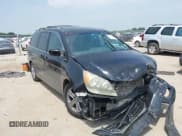 ✅ 2010 Honda Odyssey Touring • VIN: 5FNRL3H90AB070720 • Lot: 42335181. Listed on IAAI with 145,205 mi. Free auction sales archive from the USA and detailed vehicle history report at DreamBid. Image 1.