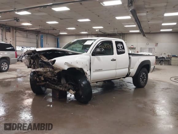 ✅ 2015 Toyota Tacoma • VIN: 5TFUX4EN9FX036973 • Lot: 41600331. Listed on IAAI with 150,343 mi. Free auction sales archive from the USA and detailed vehicle history report at DreamBid. Image 2.