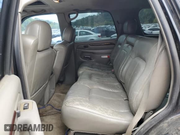 ✅ 2002 Cadillac Escalade • VIN: 1GYEK63NX2R214559 • Lot: 65007924. Wystawiony na Copart z przebiegiem 242 738 mil. Bezpłatny archiwum sprzedaży aukcyjnych z USA i szczegółowy raport historii pojazdu na DreamBid. Zdjęcie 12.