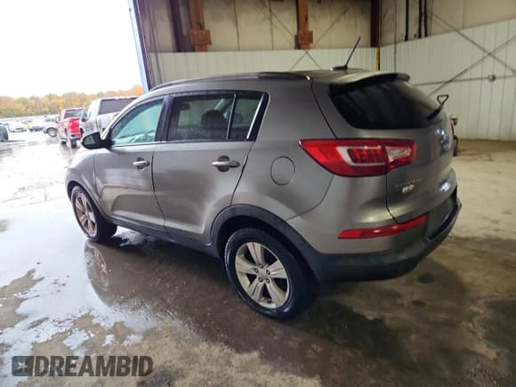 ✅ 2011 Kia Sportage LX • VIN: KNDPB3A25B7058769 • Lot: 90385075. Wystawiony na Copart z przebiegiem 143 353 mil. Bezpłatny archiwum sprzedaży aukcyjnych z USA i szczegółowy raport historii pojazdu na DreamBid. Zdjęcie 2.