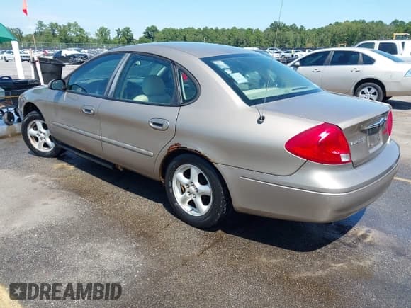 ✅ 2002 Ford Taurus SES Standard • VIN: 1FAFP55U62G123851 • Lot: 43113374. Listed on IAAI with 245,423 mi. Free auction sales archive from the USA and detailed vehicle history report at DreamBid. Image 3.